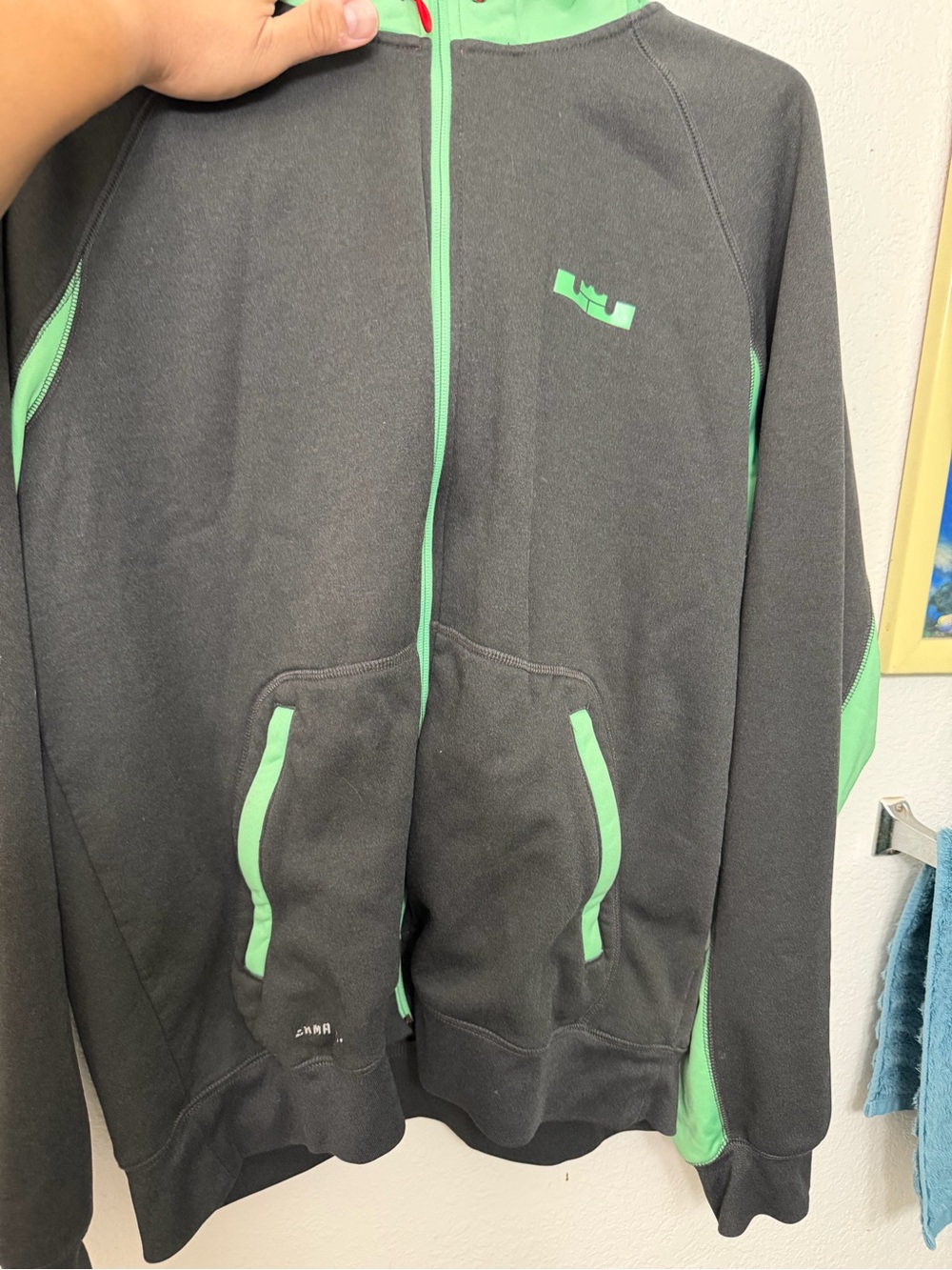 Nike Dark Gray Therma-Fit Jacket with Mint Green Trim and Red Accent